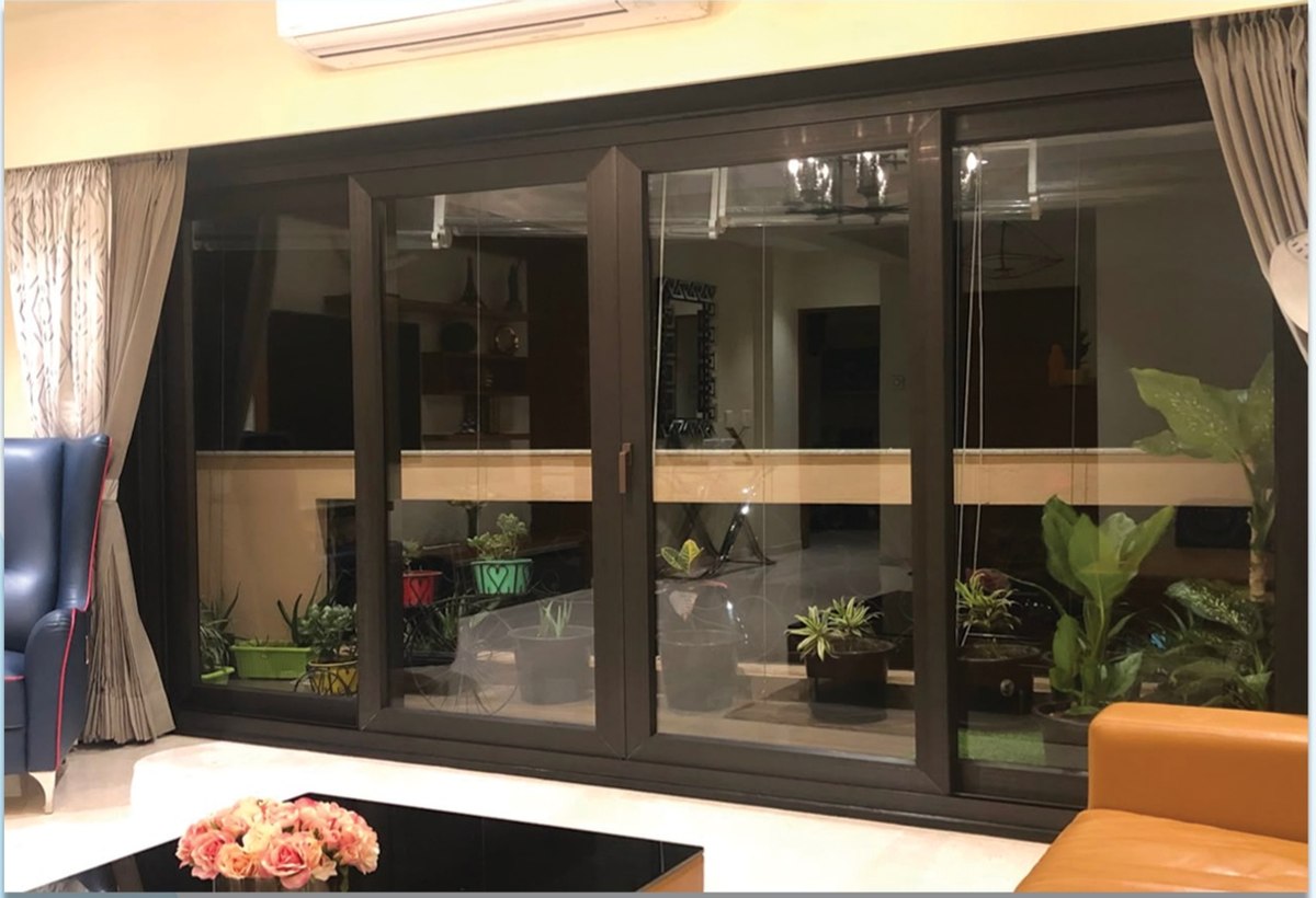 InGlaze uPVC windows and doors in Mangalore installed in a living room